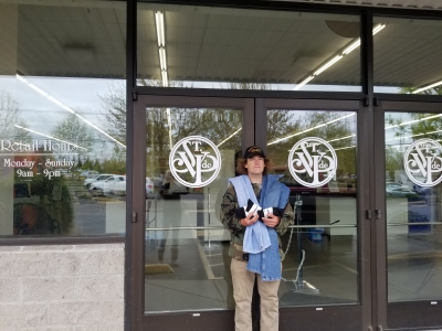 homeless veteran in front of svdp thrift store